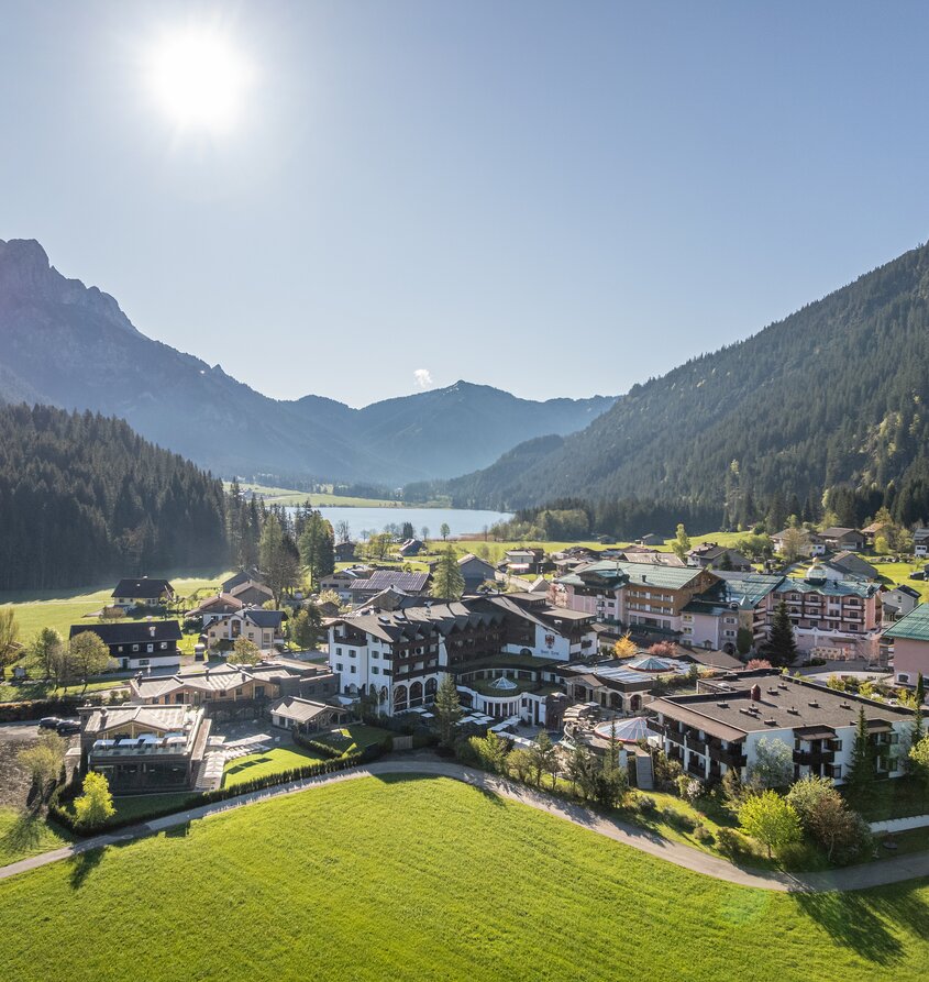 Hotel Tyrol at Haldensee, aerial view with mountains